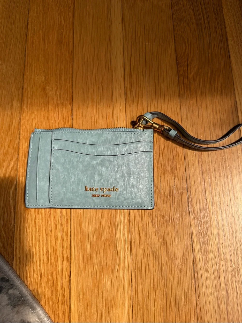 kate spade light mint leather wristlet card case with gold logo